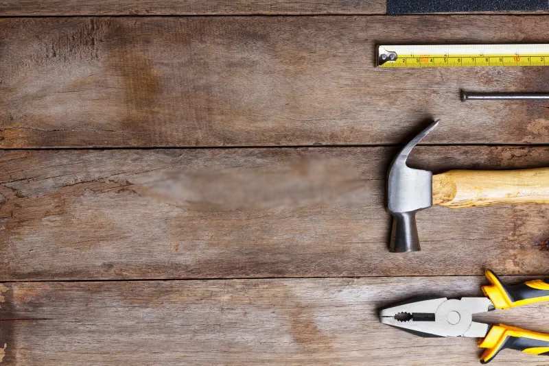 https://handymanconnection.com/wp-content/uploads/2026/08/instruments-wooden-table-copy-space-86225904.jpg