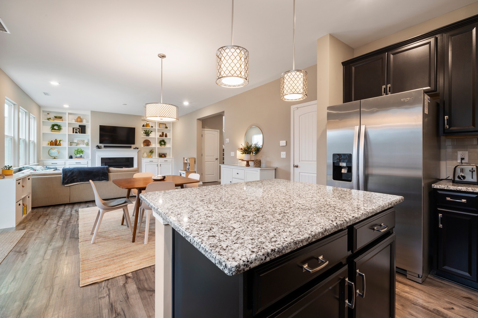 https://handymanconnection.com/wp-content/uploads/2025/12/canva-a-silver-refrigerator-near-lights-MAEXyp9T0W4.jpg