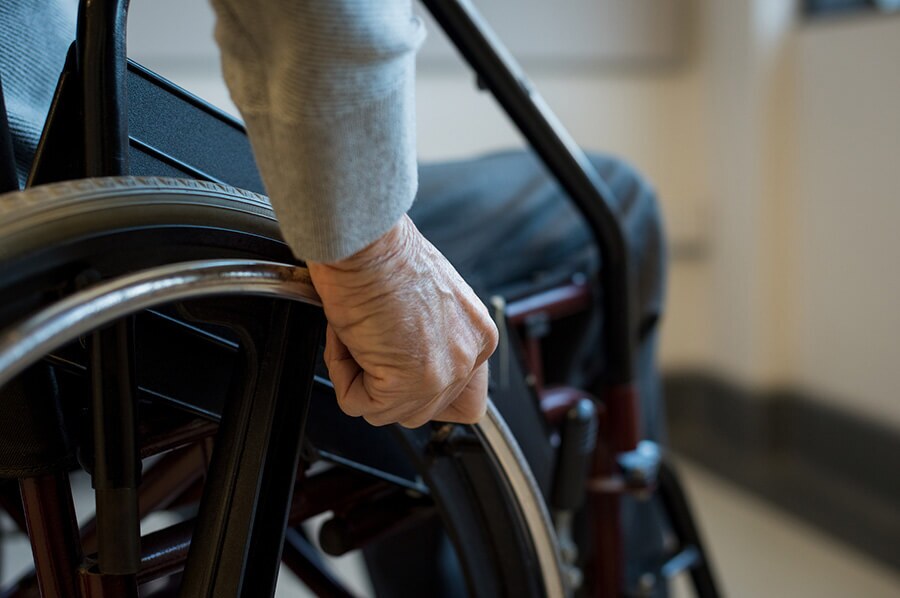 https://handymanconnection.com/wp-content/uploads/2021/05/bigstock-Paralyzed-old-man-using-his-wh-185397136.jpg