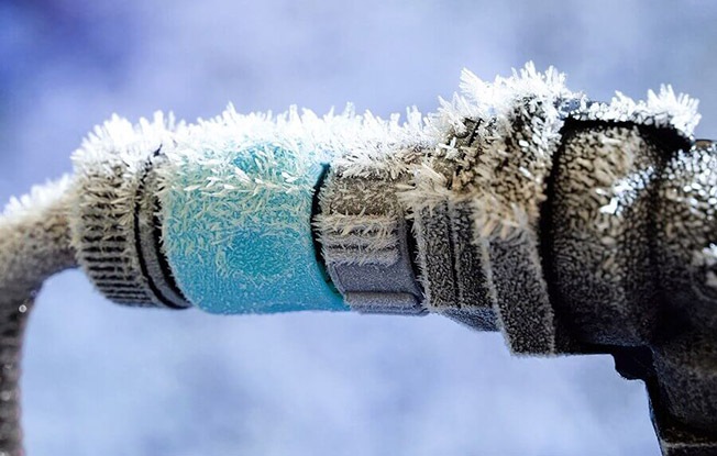 https://handymanconnection.com/wp-content/uploads/2021/05/bigstock-Frozen-Water-Connection-1787019.jpg